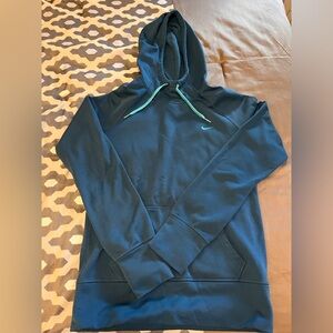 Woman’s Nike Therma Fit sweatshirt.